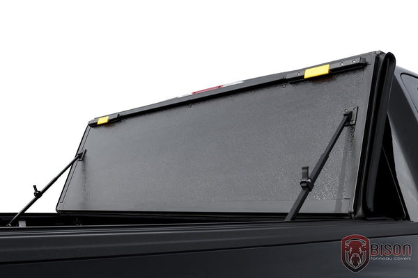 Nissan Frontier Flip Back Hard Tri-fold Tonneau Cover – Bison Tonneau ...